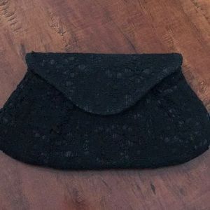 Lauren Merkin lace clutch